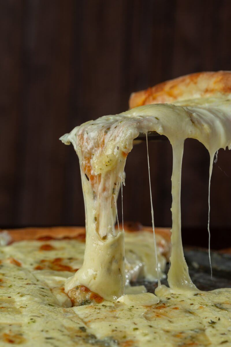 Pizza with melting cheese.