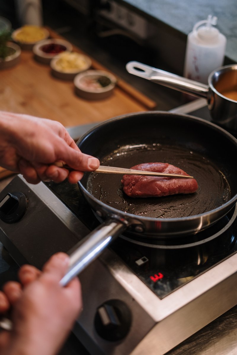 Meat in frying pan